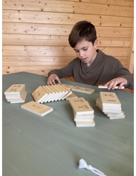 Dominó amb dibuixos ancestrals