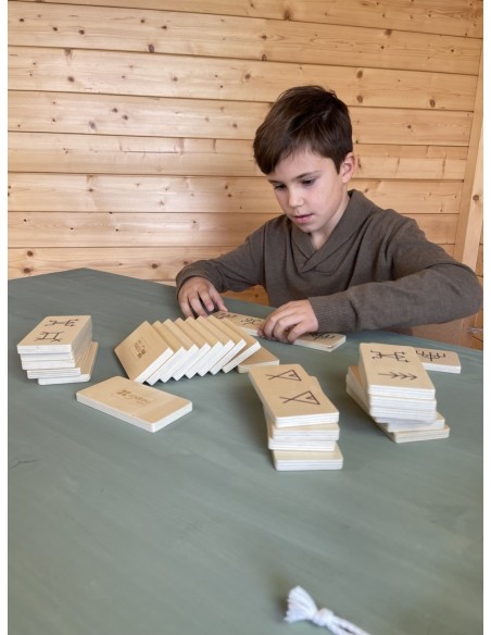 Dominó con dibujos ancestrales