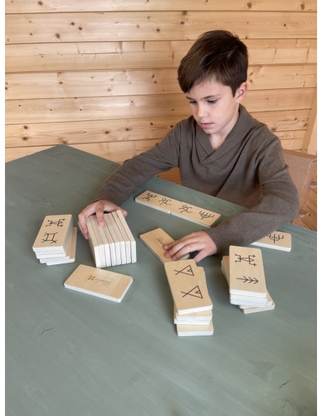 Dominó amb dibuixos ancestrals